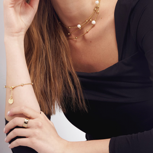 Bracciale in bronzo dorato e perle naturali